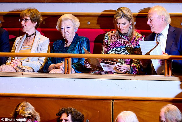 The Dutch royal, 53, appeared absorbed in the anniversary concert programme