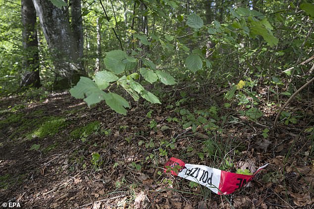 A police cordon lies on the forest floor in connection with the first use of the death capsule Sarco by assisted dying group The Last Resort, in Merishausen, Switzerland, September 25, 2024