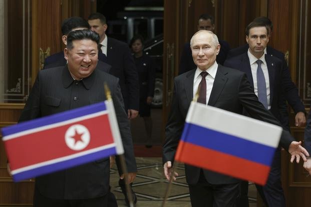 Russian President Vladimir Putin and North Korea's leader Kim Jong Un