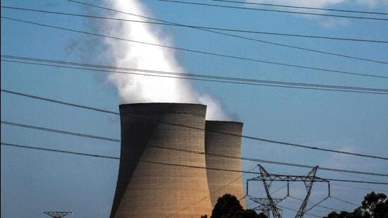 Electricity lines passing near the emission funnels of the Bayswater coal-powered thermal power station near the central New South Wales town of Muswellbrook, Australia. (AFP)