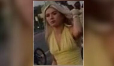 She turned up to a riot wearing a yellow dress and holding a box of eggs