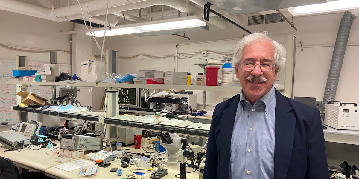 Professor Gerald Loeb in the electronics workshop in the Alfred E. Mann Department