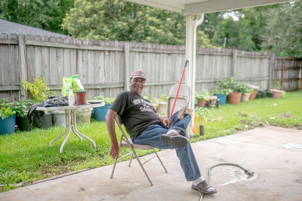 Robert Moore Jr. poses outside his home in Reserve, Louisiana, on August 12, 2021