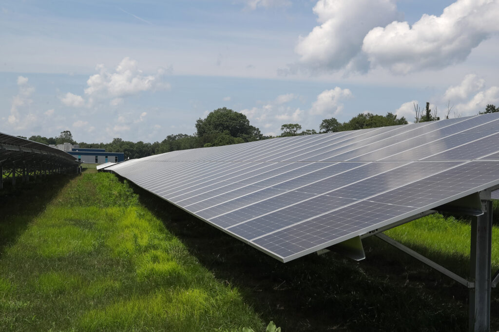 A portion of a ten-acre solar panel array is seen on the campus of Central Columbia High School in Bloomsburg, Pa. Solar energy production in the state has quadrupled, but that still puts Pennsylvania behind 28 other states. Credit: Paul Weaver/SOPA Images/LightRocket via Getty Images