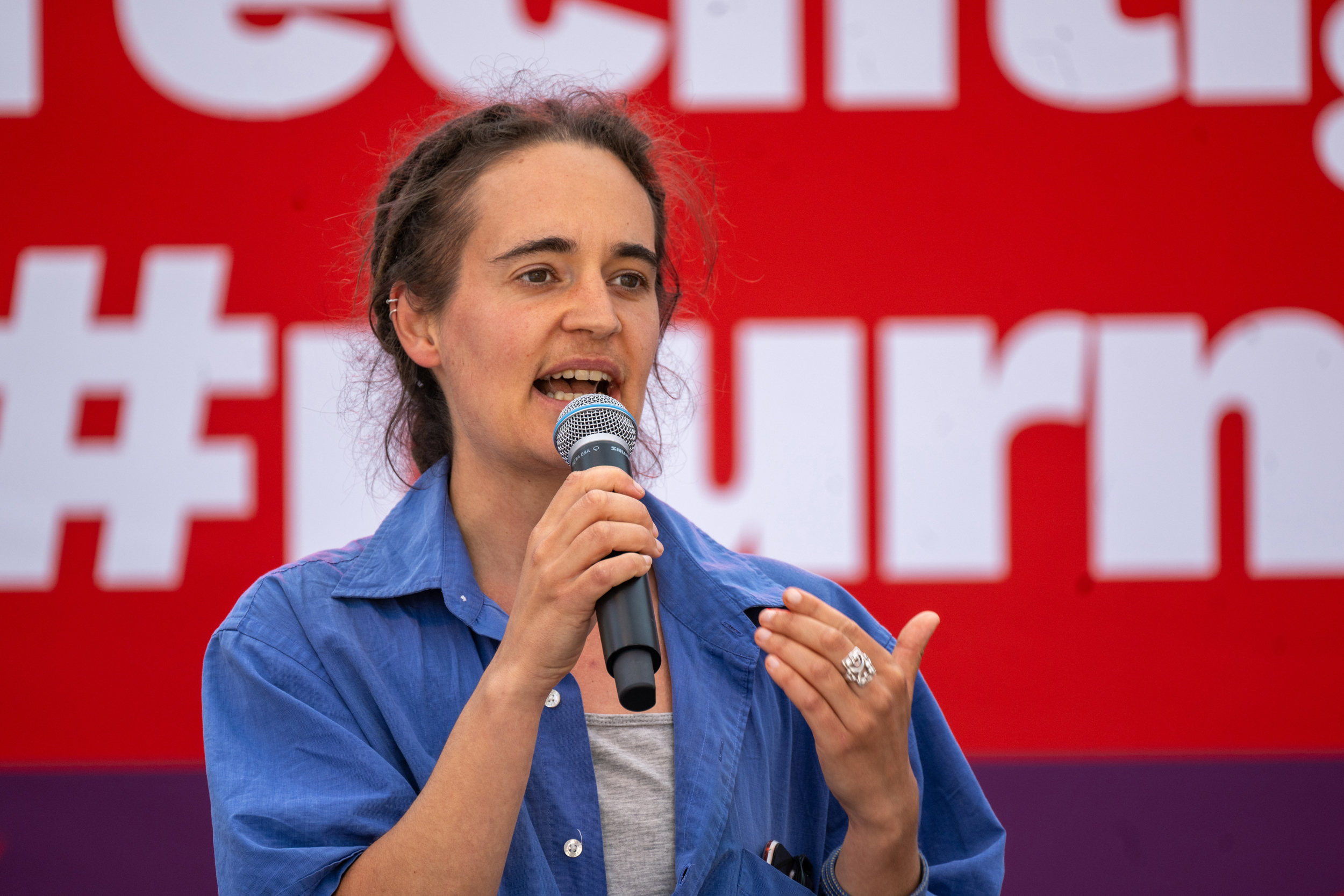 Carola Rackete speaks at a campaign event before the European elections at the Brandenburg Gate in Germany on June 7. Credit: Monika Skolimowska/picture alliance via Getty Images