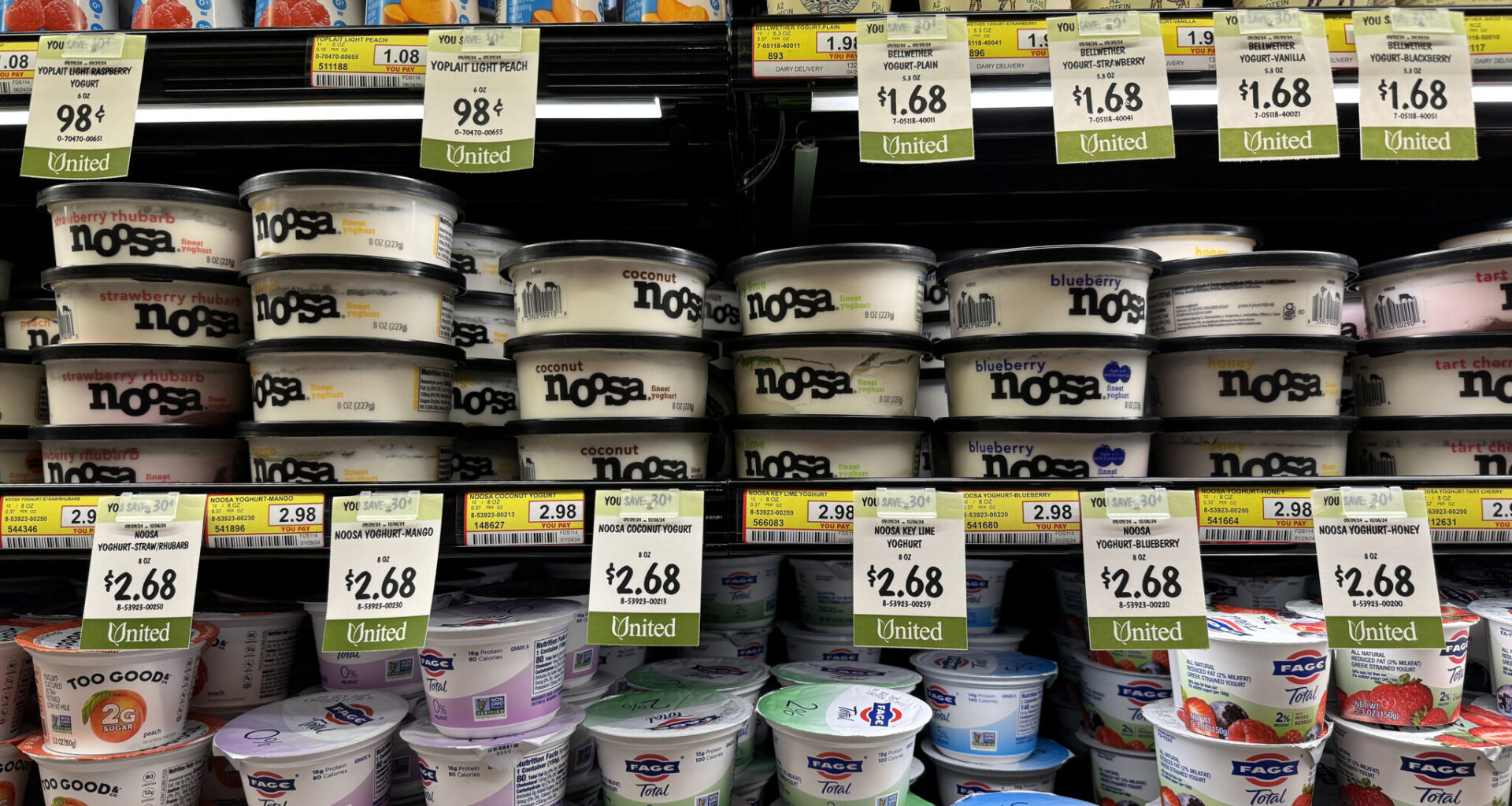 Various brands of yogurt are shown in a supermarket dairy case with sale prices are displayed at a grocery store in San Rafael, California, on September 10, 2024.