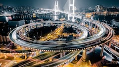 cars passing Nanpu Bridge in downtown Shanghai.