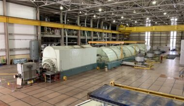 When operational, steam pushes through four turbines, turning a shaft in the generator at the front of the room to create electricity. The turbine hall at Three Mile Island Unit 1 is seen here on Oct. 16, 2024.