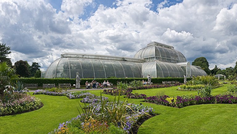 Kew Gardens Palm House. Photo by David Iliff via Wikimedia Commons, CC BY-SA 3.0.