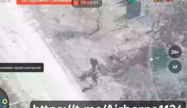 Drone footage of two Russian soldiers trying to defuse a Ukrainian IED.