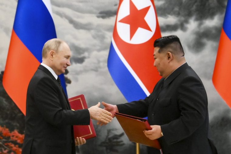 FILE - Russian President Vladimir Putin, left, and North Korea's leader Kim Jong Un exchange documents during a signing ceremony of the new partnership in Pyongyang, North Korea, on June 19, 2024. (Kristina Kormilitsyna, Sputnik, Kremlin Pool Photo via AP, File)