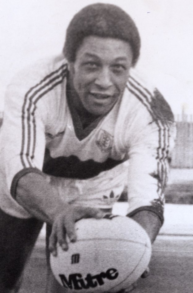 Hull KR legend Clive Sullivan: Close up photo of him holding a rugby ball on the pitch