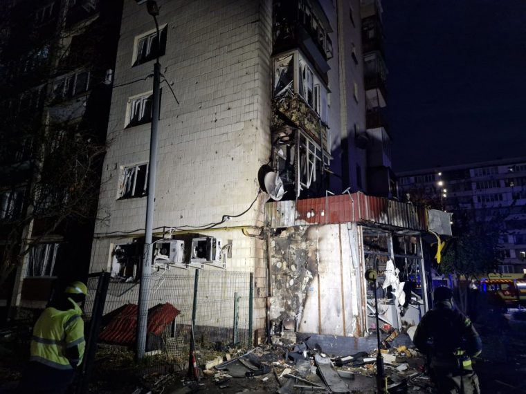 KYIV, UKRAINE - OCTOBER 29: Rescuers work at the site of the wreckage of the Russian drone on October 29, 2024 in Kyiv, Ukraine. During the night, the Russian army attacked the city with drones. The wreckage of one of the drones fell in the Solomianskyi district. It caused a fire in one of the residential buildings and ignited cars. Four people were injured. (Photo by Roman Petushkov/Global Images Ukraine via Getty Images)