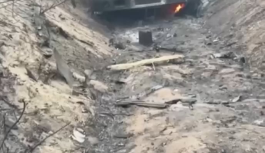 A russian soldier films the remains of his units equipment after a ukrainian strike [said to be from "Sever"-forces grouping at Kharkiv frontline, October 2024]