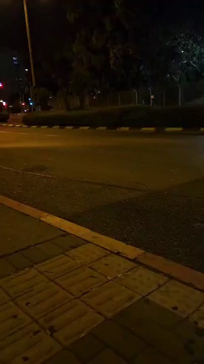 Pedestrian in Israel (Haifa) almost getting hit by a missile