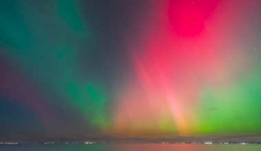 Northern Lights over Aran Islands and Galway coastline