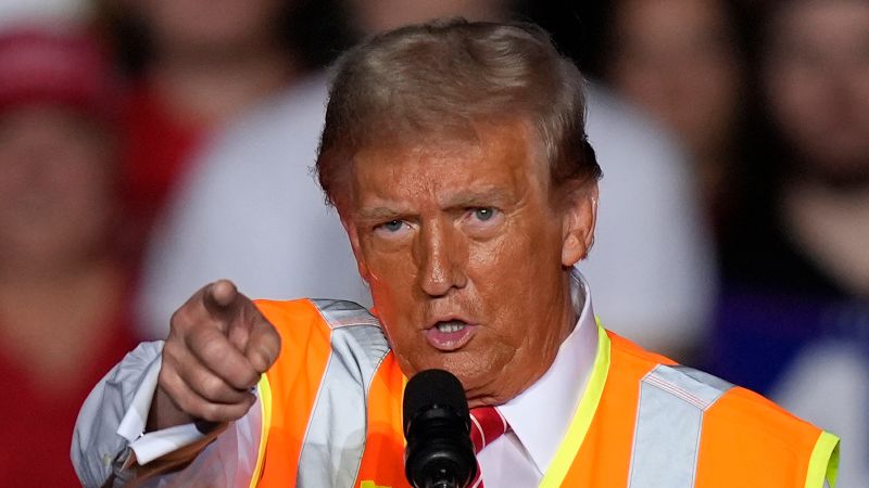 Trump, with a vest and props, turns his attention to trashing Biden over ‘garbage’ gaffe