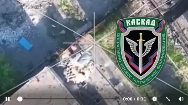 DPR Drone dropping what looks to be a fishnet bag full of old bottles onto a Ukrainian drone causing one of it's propellers to break. [late 2022/ early 2023]