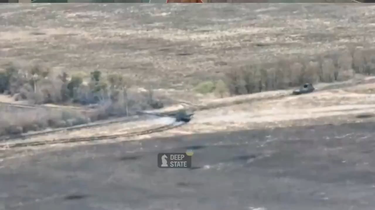 An Ukrainian T-64 tank shoots a charging Russian MT-LB point-blank range.