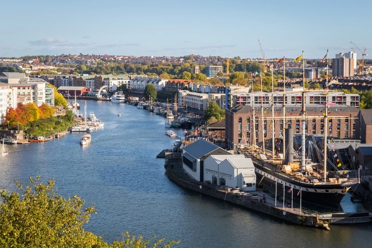 Bristol waterfront and cityscape in England, featuring Bristol Harbourside, Spike Island, Bristol Feeder Canal and Brunel's SS Great Britain museum ship