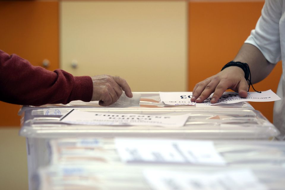 An early voter casts his vote in the polling station on the outskirts of Sofia, Bulgaria (Valentina Petrova/AP)