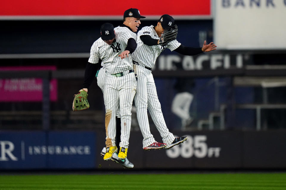 The Yankees outfield celebrates their Game 4 victory. (Daniel Shirey/MLB Photos via Getty Images)