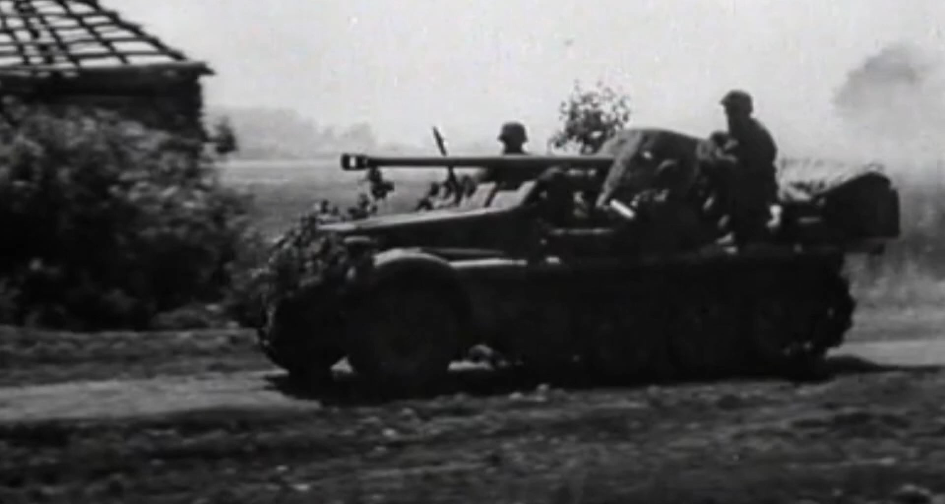 Sd.Kfz. 10 half-track field modified with a 5cm Pak 38 anti-tank gun engaging a Soviet T-34/76 tank on the Eastern Front in 1943