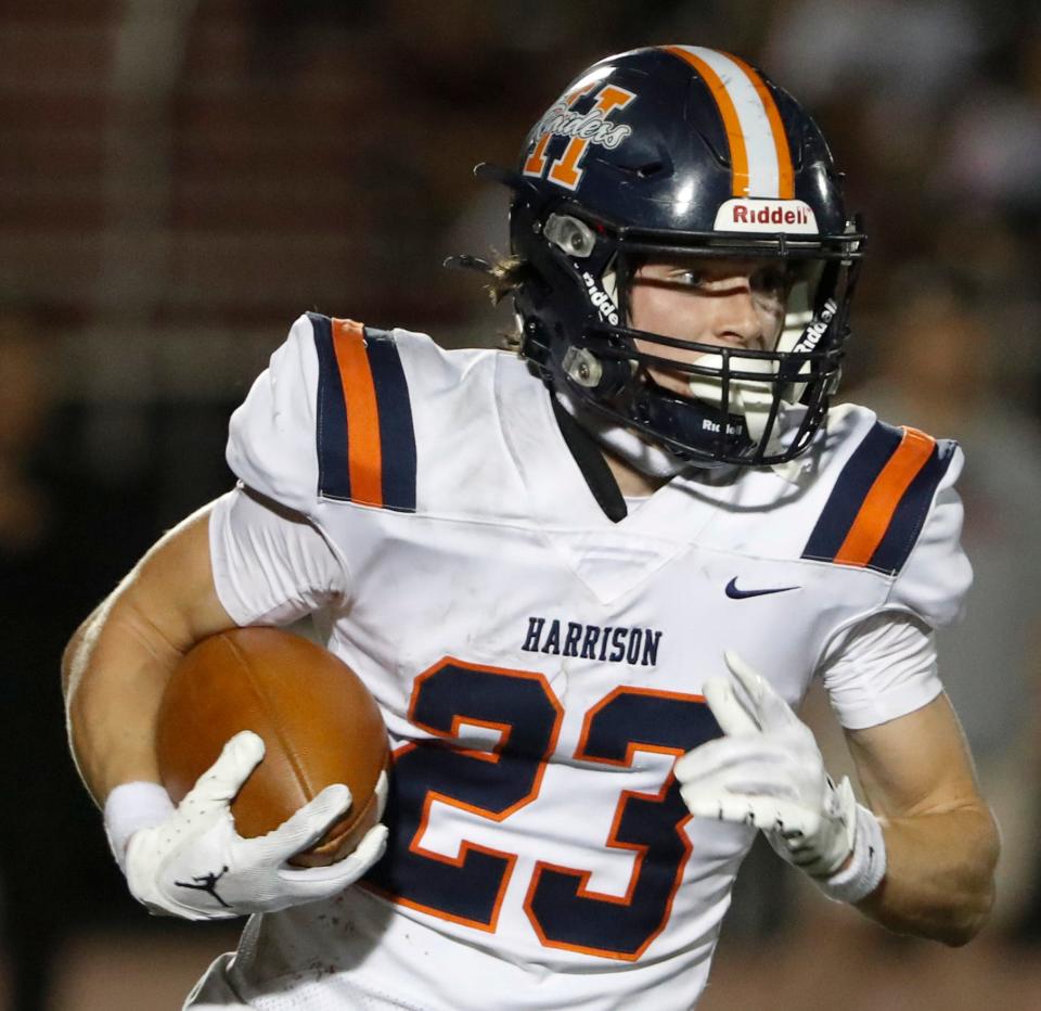 Harrison Raiders Jack Gonzalez (23) runs with the ball Friday, Oct. 11, 2024, during the IHSAA football game against the Lafayette Jeff Bronchos at Lafayette Jeff High School in Lafayette, Ind. Lafayette Jeff won 45-21.