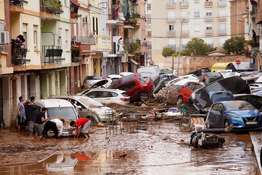 Cars piled up after a flood