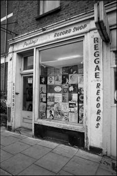 Black and white photo of a record store