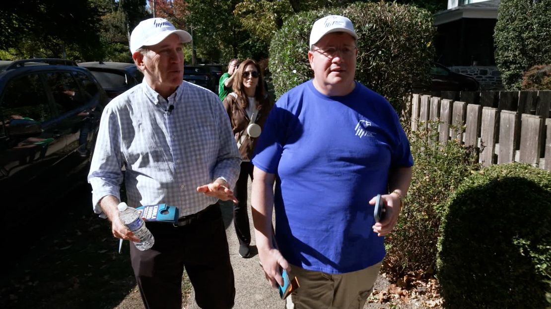 Democratic former Rep. Peter Deutsch, left, canvases for Donald Trump in Bala Cynwyd, Pennsylvania.