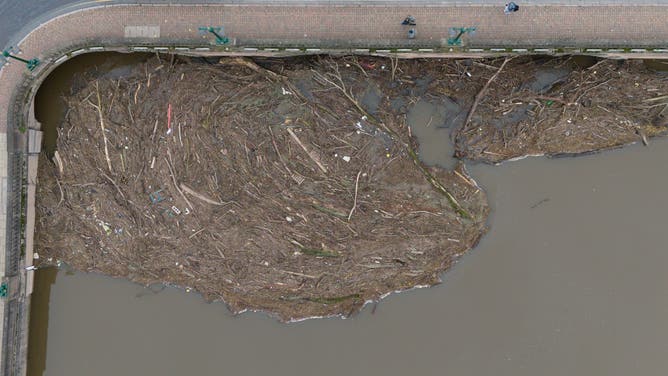 Debris by a bridge on the river Severn in Worcester. Flood warnings remained in place across the UK on Monday after Storm Ashley made its presence felt. Picture date: Monday October 21, 2024.