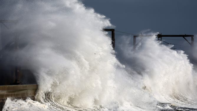 SALTCOATS, SCOTLAND - OCTOBER 20: Waves crash against the see defences as storm Ashley arrives on October 20, 2024 in Saltcoats, Scotland, United Kingdom. The Met Office had issued an amber warning for wind today across parts of western and northern Scotland.