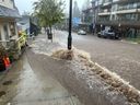 Heavy rainfall can be seen flooding Deep Cove's Gallant Avenue in this Oct. 19, 2024 photo.