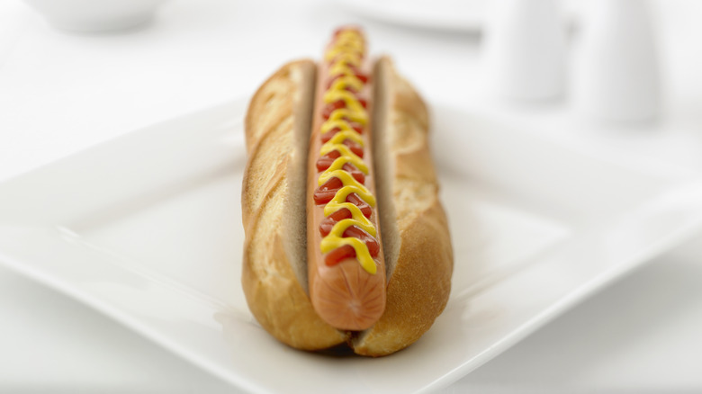 Hot dog on a white plate