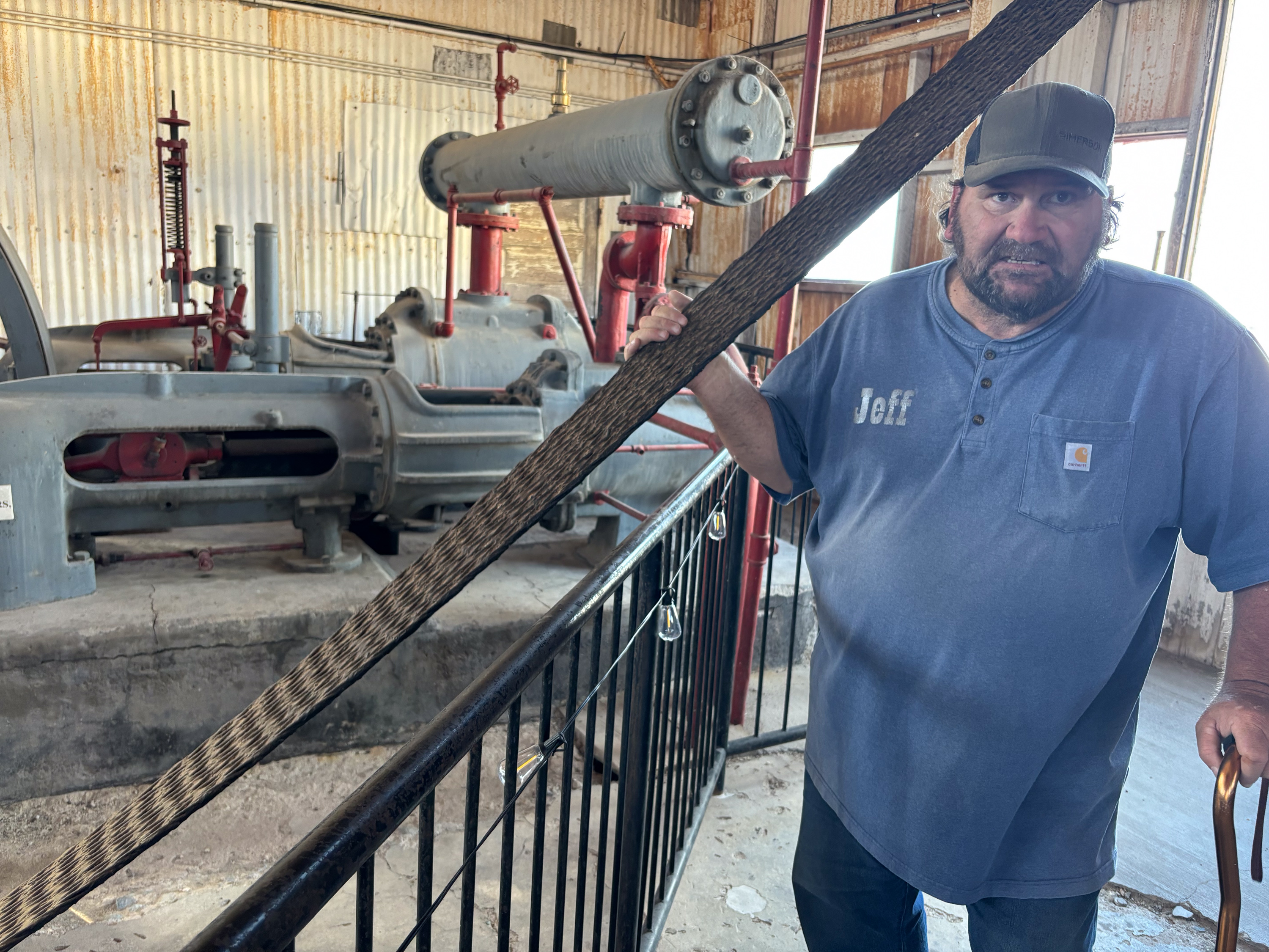 Tonopah Historic Mining Park tour guide Jeff Martin shows off a hoist house at a former silver mine.