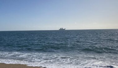 Aircraft carrier just off the beach in Devon