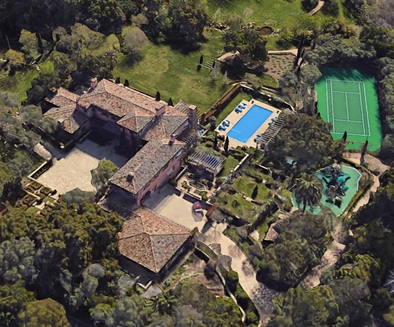 The massive nine-bedroom home has 16 bathrooms, a pool and a tennis court