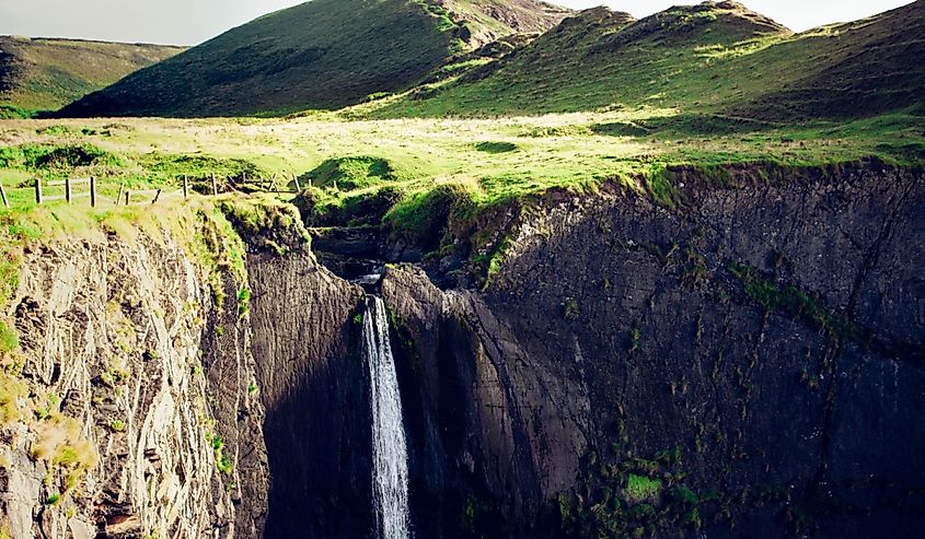 Speke's Mill Mouth waterfall near Hartland Quay in North Devon, England