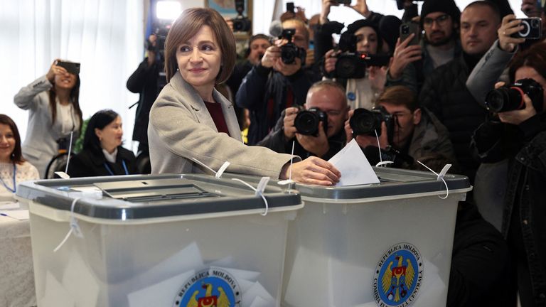 Moldova's incumbent President and presidential candidate Maia Sandu casts her ballots at a polling station, as the country holds a presidential election and a referendum on joining the European Union, in Chisinau, Moldova October 20, 2024. REUTERS/Vladislav Culiomza