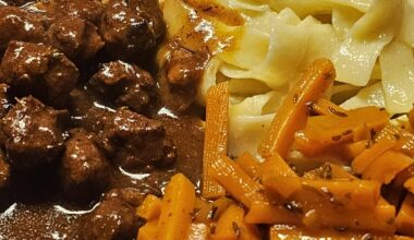 Meatballs made from Bratwurst meat and glazed caraway carrots from leftovers; served with Fettuccine