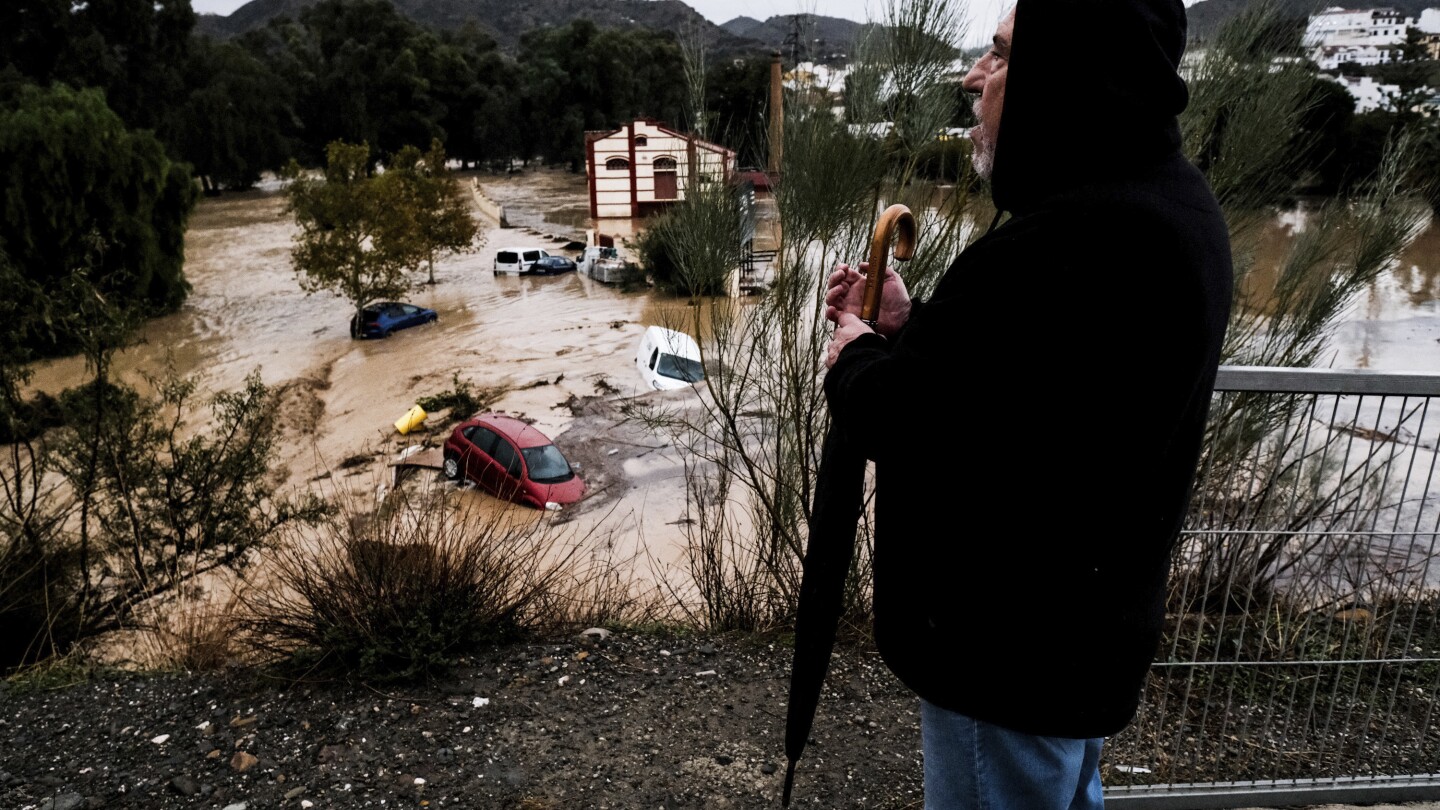 Flash floods in Spain sweep away cars, disrupt trains and leave several missing