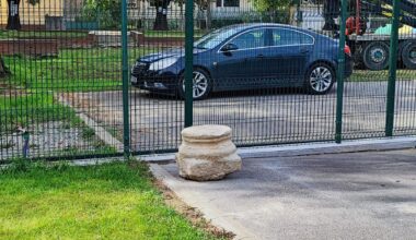 Ancient greek column base in a parking lot in Bulgaria