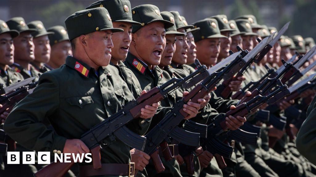 File photo of North Korean soldiers marching during a mass rally