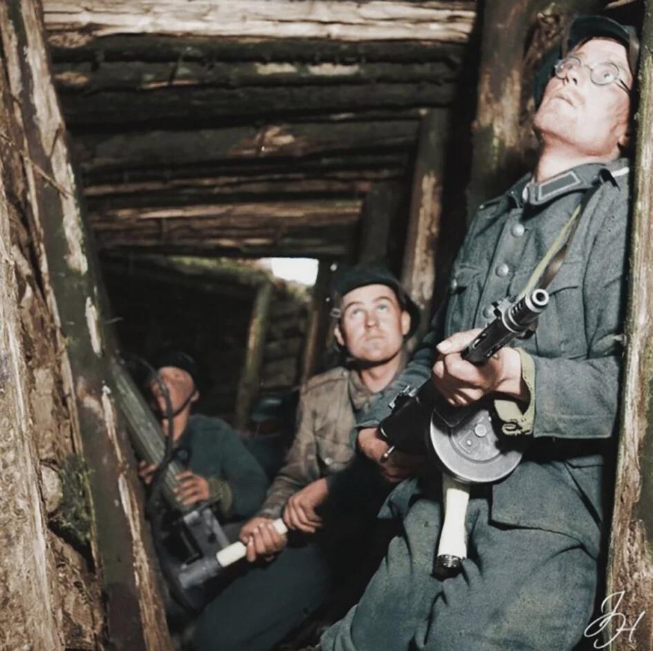 Finnish soldiers take cover from Russian artillery, 1944