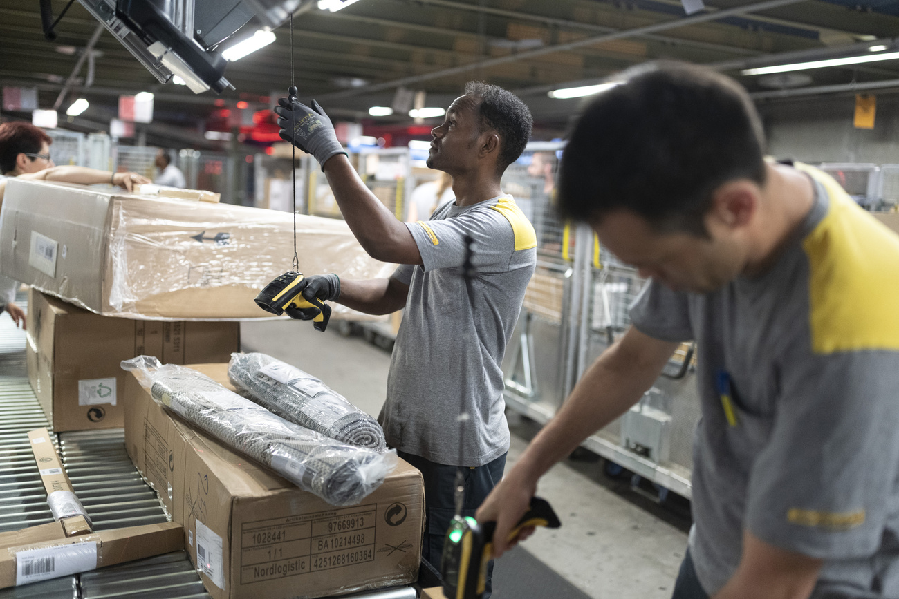 A male apprentice at Swiss Post