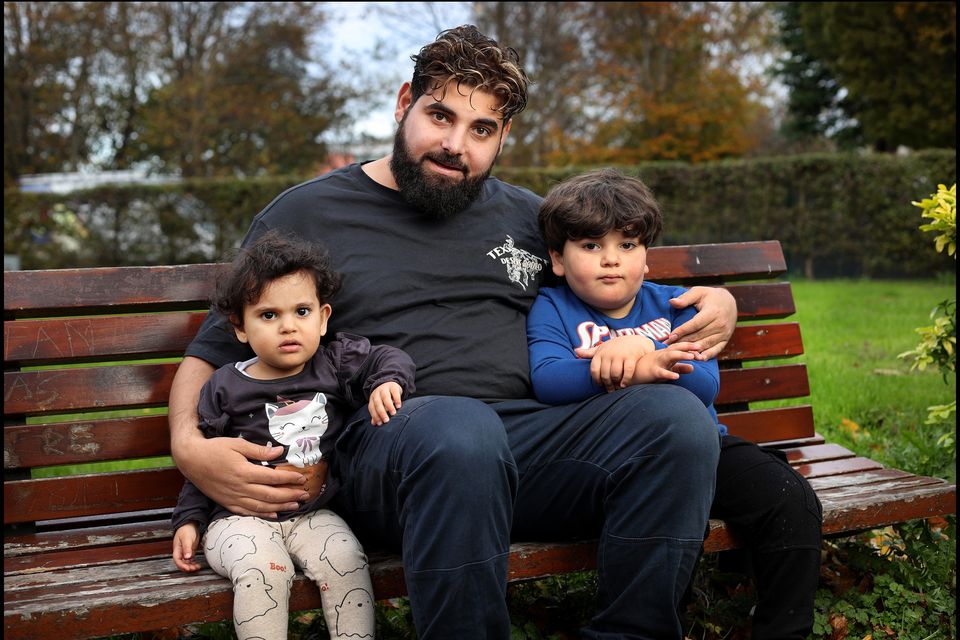 Khalid El Astal with his daughter Sara and his son Ali in Sallynoggin, Co Dublin. Photo: Steve Humphreysd