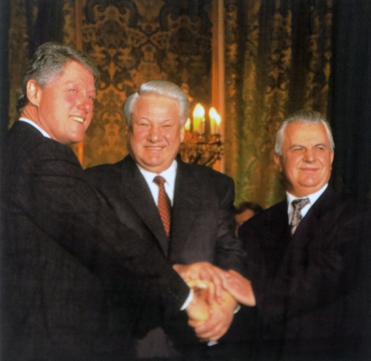 U.S. President Clinton, Russian President Yeltsin, and Ukrainian President Kravchuk after signing the Trilateral Statement in Moscow on Jan. 14, 1994.