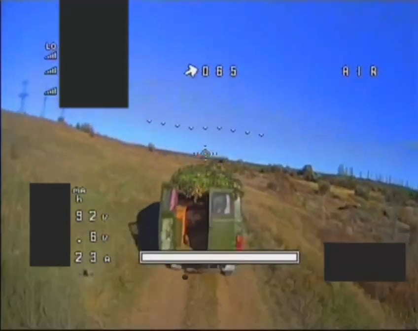 Russian "Buhanka" ("Loaf") supply van jettisons cargo while fleeing a Ukrainian FPV strike drone, in an ultimately unsuccessful attempt to gain speed and escape. Published November 5, 2024