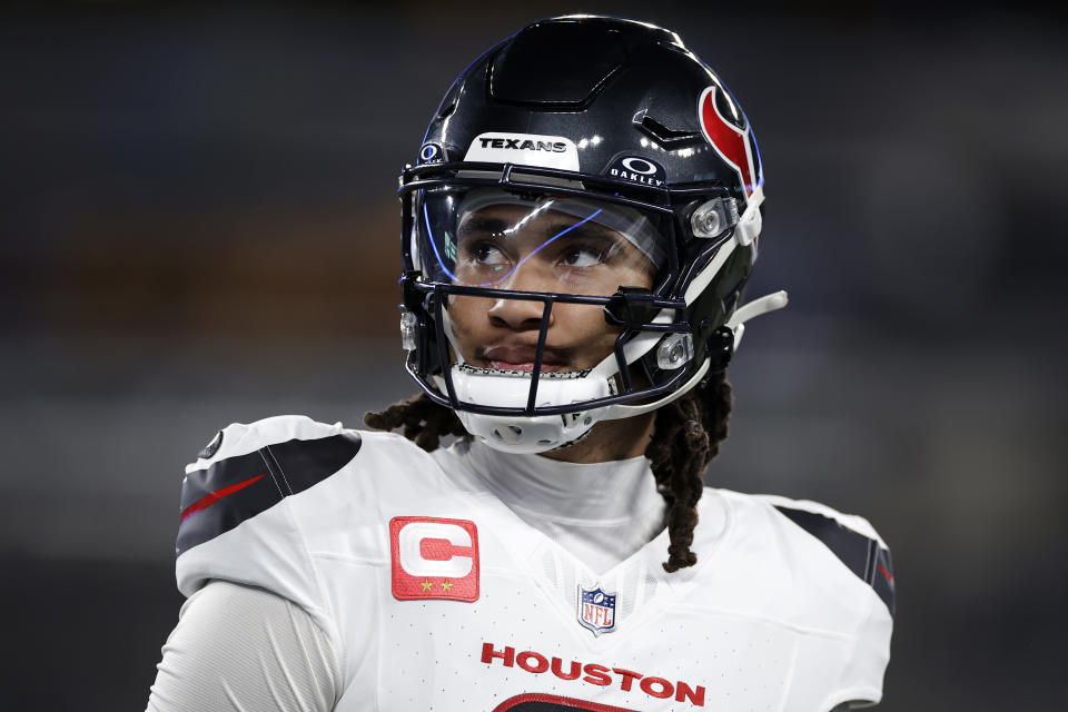 Houston Texans quarterback C.J. Stroud (7) warms up before an NFL football game against the New York Jets Thursday, Oct. 31, 2024, in East Rutherford, N.J. (AP Photo/Adam Hunger)